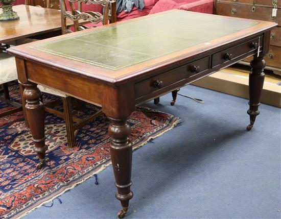 A Victorian mahogany writing table W.153cm